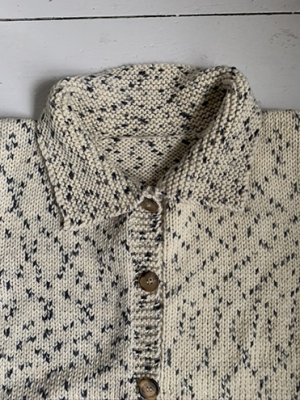 Hand knitted cardigan with collar